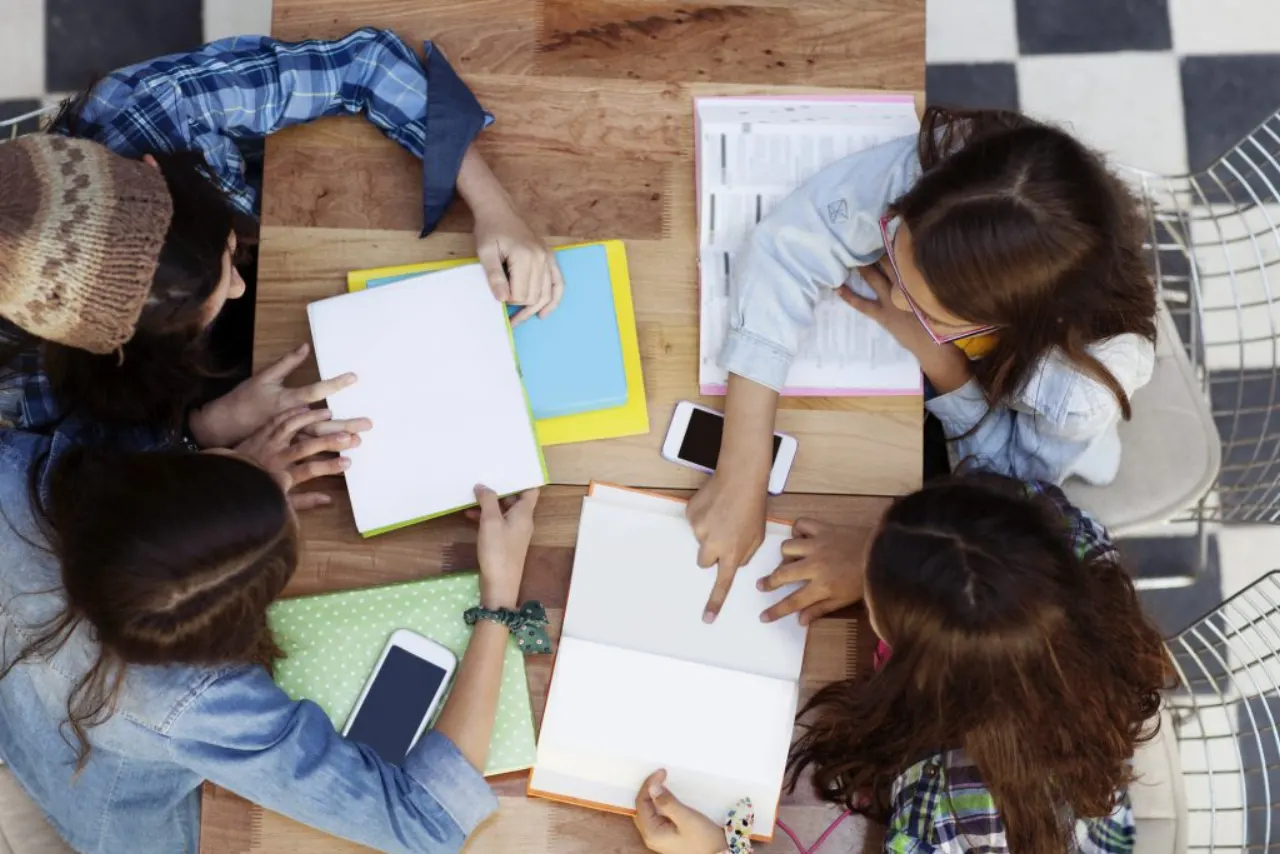 Students studying together around a table